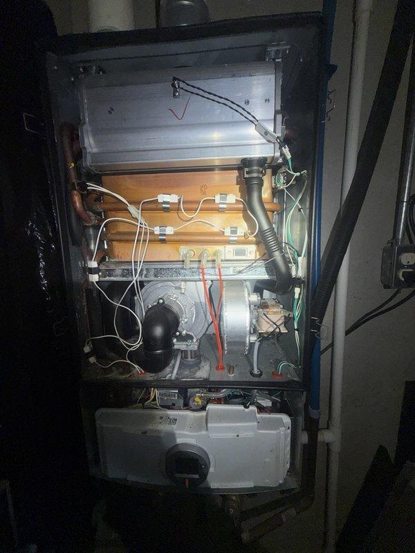 Responded to service call for tankless water heater with no hot water and GFCI tripping issues. Performed diagnostic inspection of unit interior, identifying potential electrical fault causing ground fault condition. Completed preventative maintenance flush of tankless system to remove mineral buildup and scale accumulation from heat exchanger. Inspected internal components including condensate collection system, electrical connections, and wiring integrity. Cleaned debris from condensate pump assembly and verified proper drainage function. Evaluated all wire connections and terminations for signs of moisture intrusion or corrosion that could contribute to GFCI tripping. Performed plumbing preventative maintenance inspection of associated water supply lines and connections. Unit operational status assessed and recommendations provided for any necessary repairs to resolve recurring GFCI fault condition.