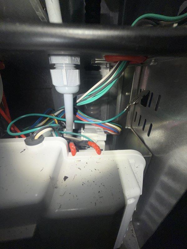 Responded to service call for tankless water heater with no hot water and GFCI tripping issues. Performed diagnostic inspection of unit interior, identifying potential electrical fault causing ground fault condition. Completed preventative maintenance flush of tankless system to remove mineral buildup and scale accumulation from heat exchanger. Inspected internal components including condensate collection system, electrical connections, and wiring integrity. Cleaned debris from condensate pump assembly and verified proper drainage function. Evaluated all wire connections and terminations for signs of moisture intrusion or corrosion that could contribute to GFCI tripping. Performed plumbing preventative maintenance inspection of associated water supply lines and connections. Unit operational status assessed and recommendations provided for any necessary repairs to resolve recurring GFCI fault condition.