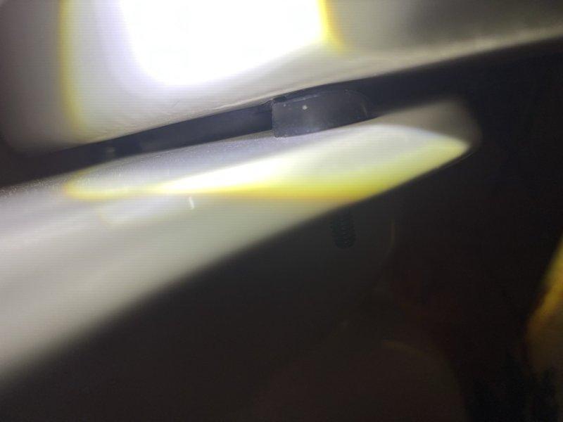 Responded to reported toilet leak in hall bathroom. Upon inspection, identified water leaking from beneath the toilet base and migrating toward the sink area. Documented water damage to flooring surface with visible moisture present. Inspected toilet mounting, wax ring seal, and supply line connections in confined space beneath fixture. Additional repairs required to properly address leak source and restore proper function.