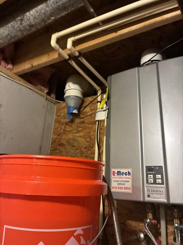 Performed preventive plumbing maintenance on Rinnai tankless water heater, completing a thorough descaling flush to remove mineral buildup and maintain optimal performance. Verified system pressure readings within normal operating range and confirmed proper venting configuration. Unit tested successfully following service with all components functioning as designed.