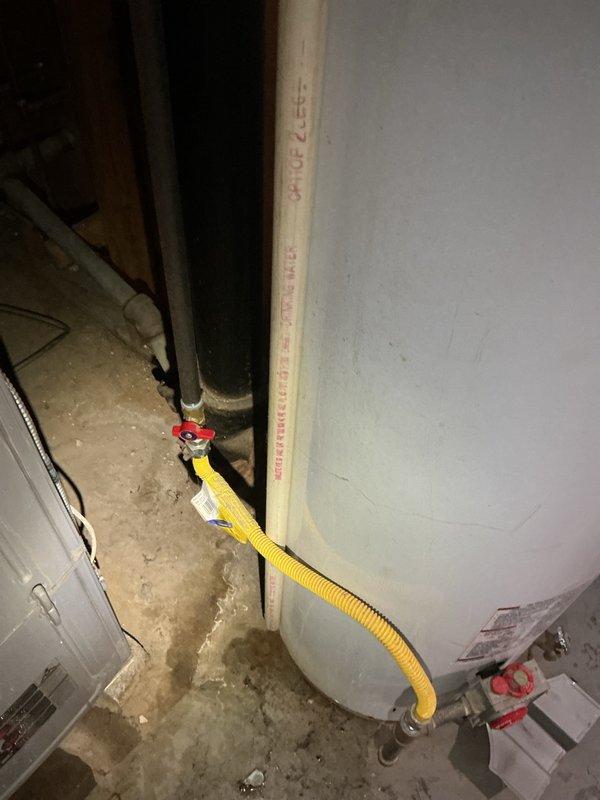 Conducted on-site assessment of existing EverKleen water heater for replacement estimate. Inspected current installation including tank condition, plumbing connections, gas/electrical supply lines, venting system, and clearance requirements. Evaluated flexible corrugated connector, pressure relief valve piping, and shut-off valves at base of unit. Documented existing configuration and utility connections in unfinished basement mechanical room. Photographed water heater specifications, EnergyGuide label, and surrounding infrastructure to provide accurate replacement quote. Noted concrete floor conditions and accessibility for equipment removal and new installation.