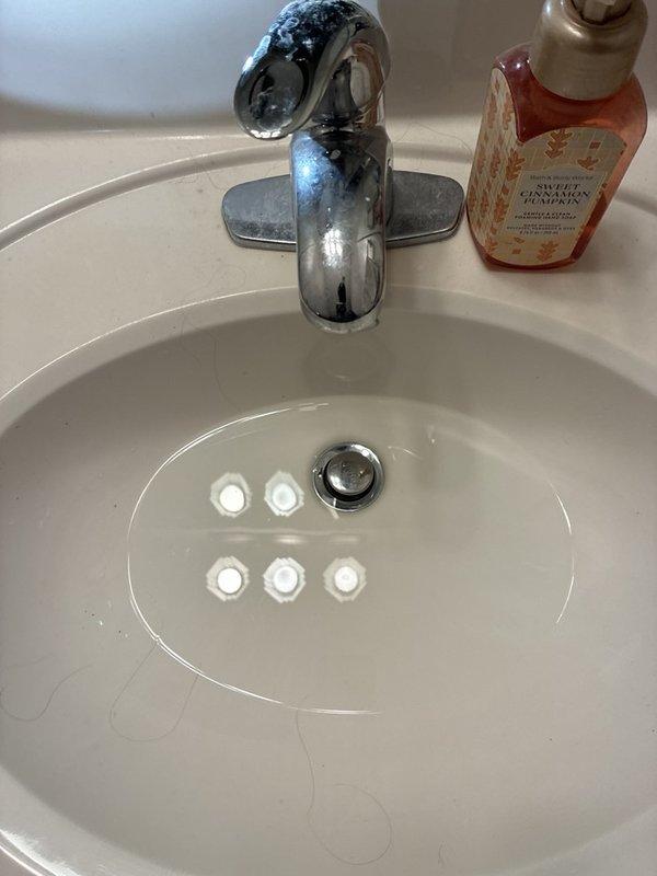 Completed routine plumbing maintenance visit inspecting bathroom fixtures. Verified proper operation of bathroom sink faucet, drain assembly, and shower valve controls. All fixtures found in good working condition with no leaks or deficiencies noted.