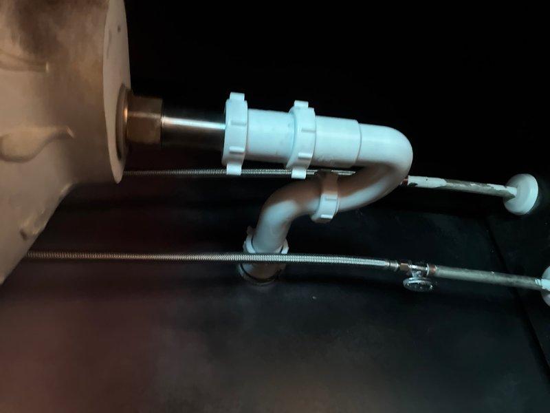 Returned to property to complete installation of new pop-up drain assembly in bathroom sink, ensuring proper fit and seal of chrome stopper mechanism. Investigated and resolved whistling noise issue in master bathroom toilet by inspecting fill valve and supply line connections. Verified all plumbing connections were secure and tested both fixtures for proper operation and leak-free performance.