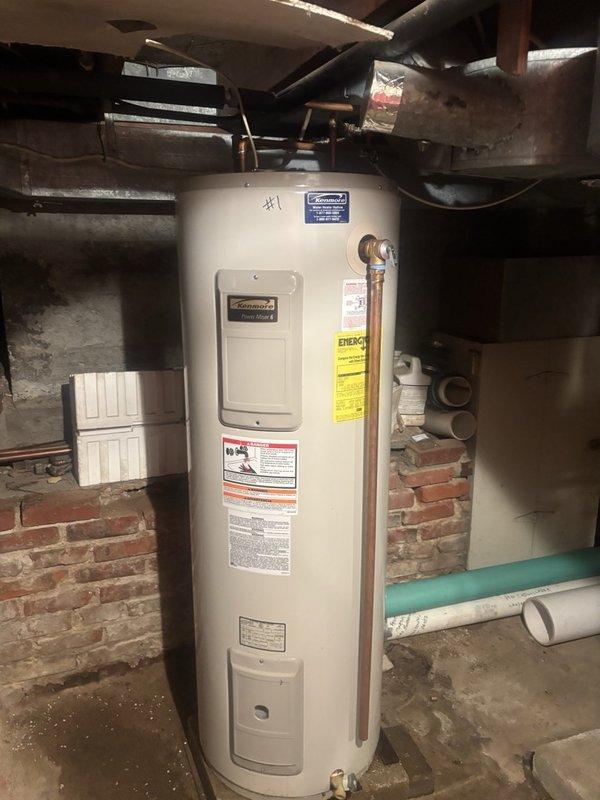Completed estimate for replacement of 50-gallon short electric water heater located in basement crawl space. Existing 15+ year old unit is currently operational but actively leaking. Installation will require addition of thermal expansion tank, as current system does not have one installed. Unit positioned in same area as furnace with connections to existing electrical service and copper supply lines with brass fittings visible at top connections.