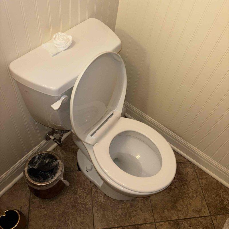 Replaced three toilet fixtures throughout the property, including two units on the main floor and one in the finished basement. Removed existing toilets, disconnected water supply lines, and removed old wax ring seals from floor flanges. Installed new toilet units with new wax rings, ensuring proper seating and alignment on floor flanges. Connected flexible braided water supply lines to shutoff valves and secured all mounting bolts. Tested each installation for proper flush operation, water flow, and checked for leaks at all connection points and base seals. All three toilets are now functioning properly with no visible leaks detected.