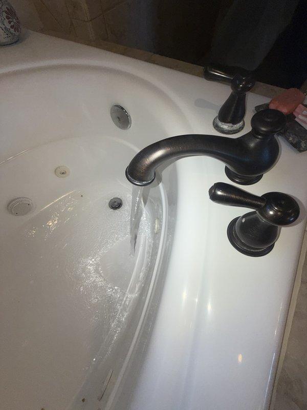 Completed preventive plumbing maintenance inspection on residential property. Investigated ongoing water pressure and temperature fluctuation issues in kitchen that developed following recent water heater installation. Tested and verified proper operation of bathroom fixtures including bathtub faucet controls and water flow. Inspected toilet installation and mounting hardware for proper function. All accessible plumbing fixtures evaluated for performance and potential concerns related to reported pressure and temperature irregularities.
