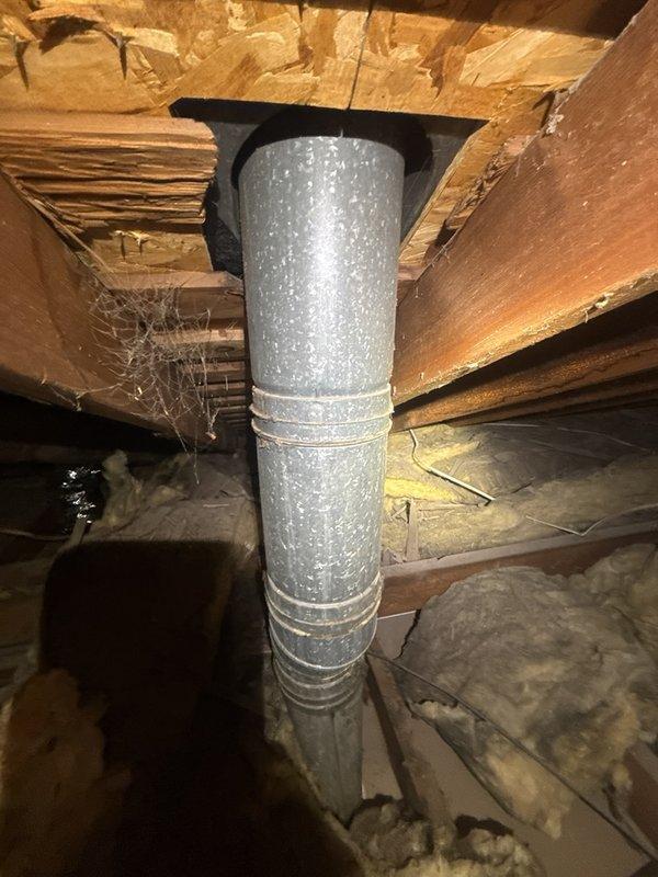 Conducted routine inspection of water heater flue pipe and venting system in basement installation. Verified proper operation of water heater unit with no deficiencies noted. Inspected galvanized metal flue duct extending through attic space, confirming secure connections and proper clearances from combustible materials. Examined water heater plumbing connections including copper supply lines, PEX distribution piping, and expansion tank installation. All components found to be functioning within normal parameters with no symptoms or issues present. Completed new account setup and established primary contact information for future service needs.