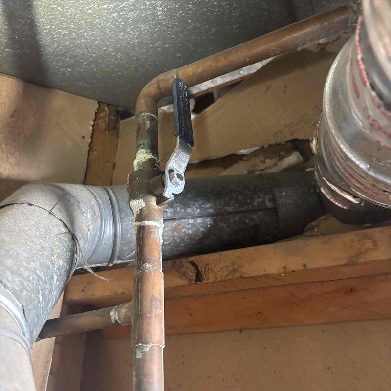 Conducted water heater replacement estimate for a gas unit over 20 years old located in the garage. Inspected existing operational water heater, evaluated surrounding plumbing connections including copper supply lines and associated ductwork infrastructure, and documented current installation conditions. Provided recommendations for replacement options based on capacity requirements and existing gas configuration.