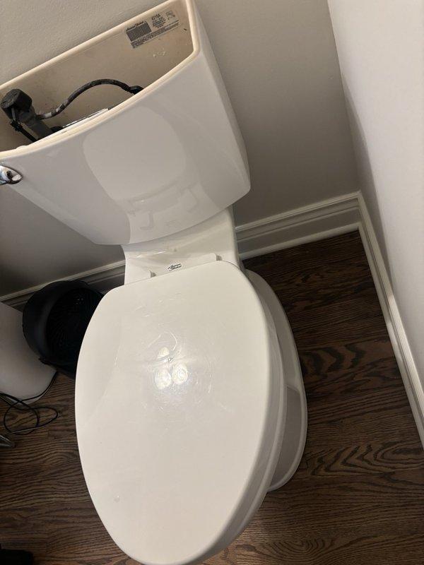 Removed and reset toilet to replace deteriorated wax ring seal and install new stool bolts. Verified proper seating of toilet fixture on flange and confirmed leak-free operation upon completion.