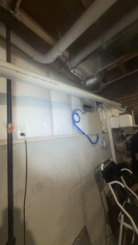 Completed preventive maintenance agreement renewal service including comprehensive tankless water heater flush procedure. Performed descaling flush on tankless unit to remove mineral buildup and maintain optimal heating efficiency, inspected all plumbing connections and water treatment system components including water softener with digital control unit, verified proper operation of all mechanical systems in utility area.