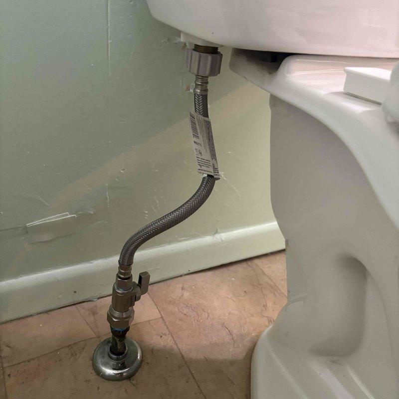 Responded to service call for toilet refill valve malfunction where fill valve required manual tapping to activate after each flush cycle. Upon inspection, diagnosed faulty fill valve mechanism with internal diaphragm failure preventing proper water flow initiation. Replaced defective ballcock-style fill valve assembly with new unit, ensuring proper water supply connection via existing braided stainless steel supply line. Adjusted float height and refill tube positioning for optimal tank water level. Tested flush cycle multiple times to verify automatic refill operation without manual intervention. Confirmed flapper seal integrity and overflow tube function. System now operating to manufacturer specifications with proper refill activation and no leaks detected.