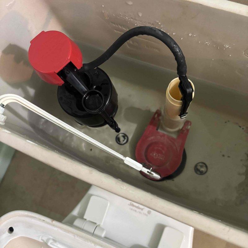 Responded to service call for toilet refill valve malfunction where fill valve required manual tapping to activate after each flush cycle. Upon inspection, diagnosed faulty fill valve mechanism with internal diaphragm failure preventing proper water flow initiation. Replaced defective ballcock-style fill valve assembly with new unit, ensuring proper water supply connection via existing braided stainless steel supply line. Adjusted float height and refill tube positioning for optimal tank water level. Tested flush cycle multiple times to verify automatic refill operation without manual intervention. Confirmed flapper seal integrity and overflow tube function. System now operating to manufacturer specifications with proper refill activation and no leaks detected.