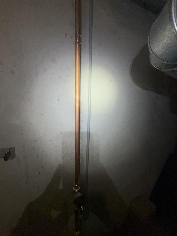 Responded to callback for water supply line leak at newly installed toilet. Upon inspection, identified leak at compression fitting connection between supply line and fill valve inlet. Tightened compression nut and verified secure connection with no additional leakage during pressure test.