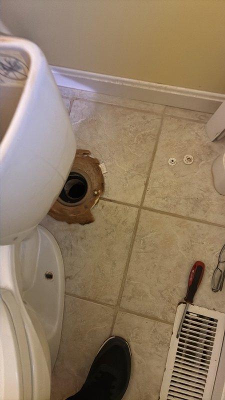 Responded to service call for toilet installation in master bathroom. Customer supplied new toilet unit for replacement. Removed existing toilet, exposing floor flange and drain connection. Inspected flange condition and verified proper seal capability. Installed customer-provided toilet, connecting to existing brass floor flange and water supply line. Adjusted tank components including flapper valve, fill valve assembly, and float mechanism to ensure proper flush operation. Tested for leaks at base seal and water supply connection. Verified stable mounting and proper bowl drainage.