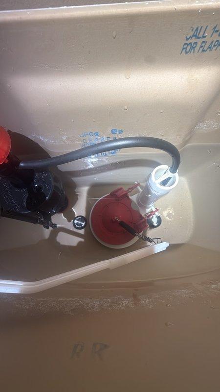Responded to ongoing toilet tank noise issue occurring every 5–10 seconds following previous float replacement. Upon inspection of master bathroom toilet tank, identified faulty flapper valve as root cause of intermittent refilling cycle. The existing red circular flapper showed signs of improper seating and wear, preventing complete seal at flush valve opening. Replaced defective flapper assembly with new component and adjusted chain length to ensure proper drop and seal. Tested flush mechanism through multiple cycles to verify elimination of phantom flushing. Confirmed water level settings and float operation within manufacturer specifications. Unit now operates silently without intermittent refilling cycles.
