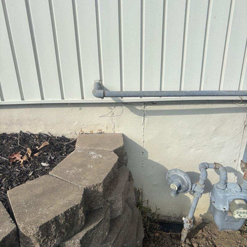 Disconnected gas line from outdoor grill located on back deck and properly capped the supply line to ensure safe termination. All gas connections were secured and tested for integrity per safety standards.