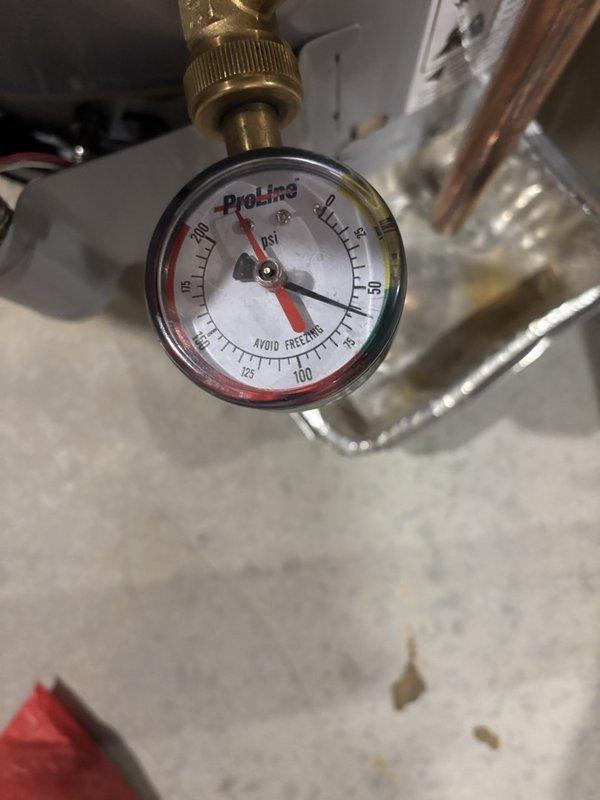 Performed a plumbing maintenance inspection of the water supply manifold and associated PEX distribution piping, including brass valves and fittings, and verified the system pressure gauge reading of approximately 50 psi, within normal operating range. Confirmed the isolation valves are clearly labeled for ON/OFF positions and found no evidence of leaks, frost damage, corrosion, or cracking on the piping, manifold, or fittings.