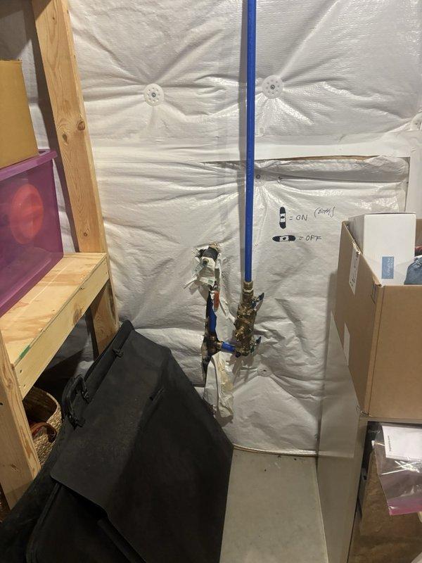 Performed a plumbing maintenance inspection of the water supply manifold and associated PEX distribution piping, including brass valves and fittings, and verified the system pressure gauge reading of approximately 50 psi, within normal operating range. Confirmed the isolation valves are clearly labeled for ON/OFF positions and found no evidence of leaks, frost damage, corrosion, or cracking on the piping, manifold, or fittings.