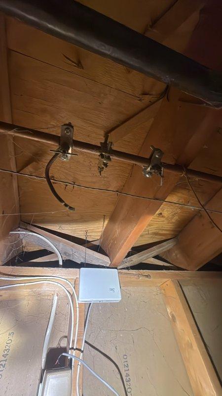Removed existing saddle valves from the copper water supply line and restored the line to a sealed, leak-free condition, eliminating a common failure point. Work was performed in the unfinished crawlspace area, and the supply piping was verified to be intact and holding pressure with no leaks.