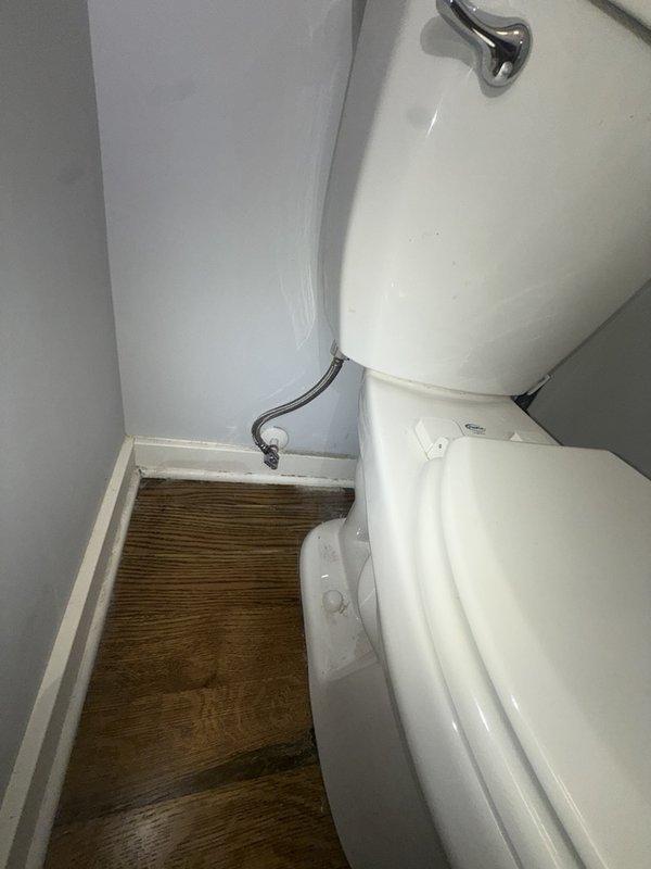 Responded to a toilet obstruction caused by a foreign object, a digital meat thermometer, lodged in the first-floor half bath toilet. Shut off the water supply at the angle stop, removed the toilet from its flange, and retrieved the obstruction from the trap. Reset the toilet with a new wax ring, reconnected the supply line, and tested for proper flush operation and leaks, with no further issues observed.
