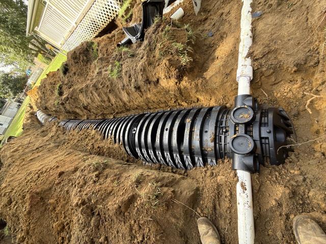 
We were hired to install a new septic system for a customer in Goldsboro. This project involved the complete installation of a new septic system to provide on-site wastewater treatment for this property. We worked closely with the local health department and environmental standards to ensure that the installation was done correctly and in compliance with all regulations.