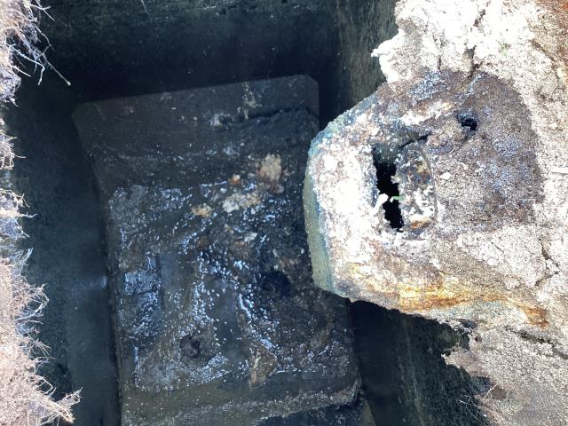 We went out to this mobile home park in Dudley to check on the condition of some of there septic systems. We went out to this one and found that the septic system needed to be pumped out. The system was working properly but the septic tank outlet did need to be replaced. 