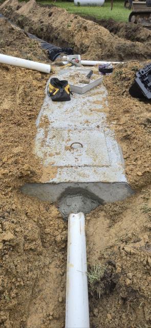 
I was hired to install a septic system for a customer in Kinston. This project involved the complete installation of a new septic system to provide on-site wastewater treatment for this property. We worked closely with the local health department and environmental standards to ensure that the installation was done correctly and in compliance with all regulations.
