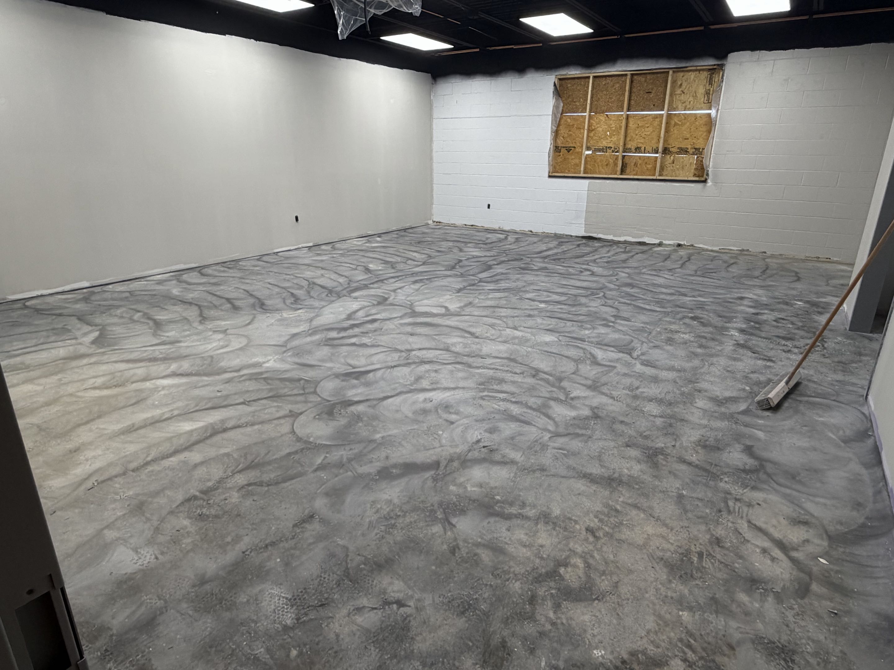 Lights are burning. Receptacles are hot. First coats of paint being applied. Brand new floor tile going in. Great overall progress as a project. 