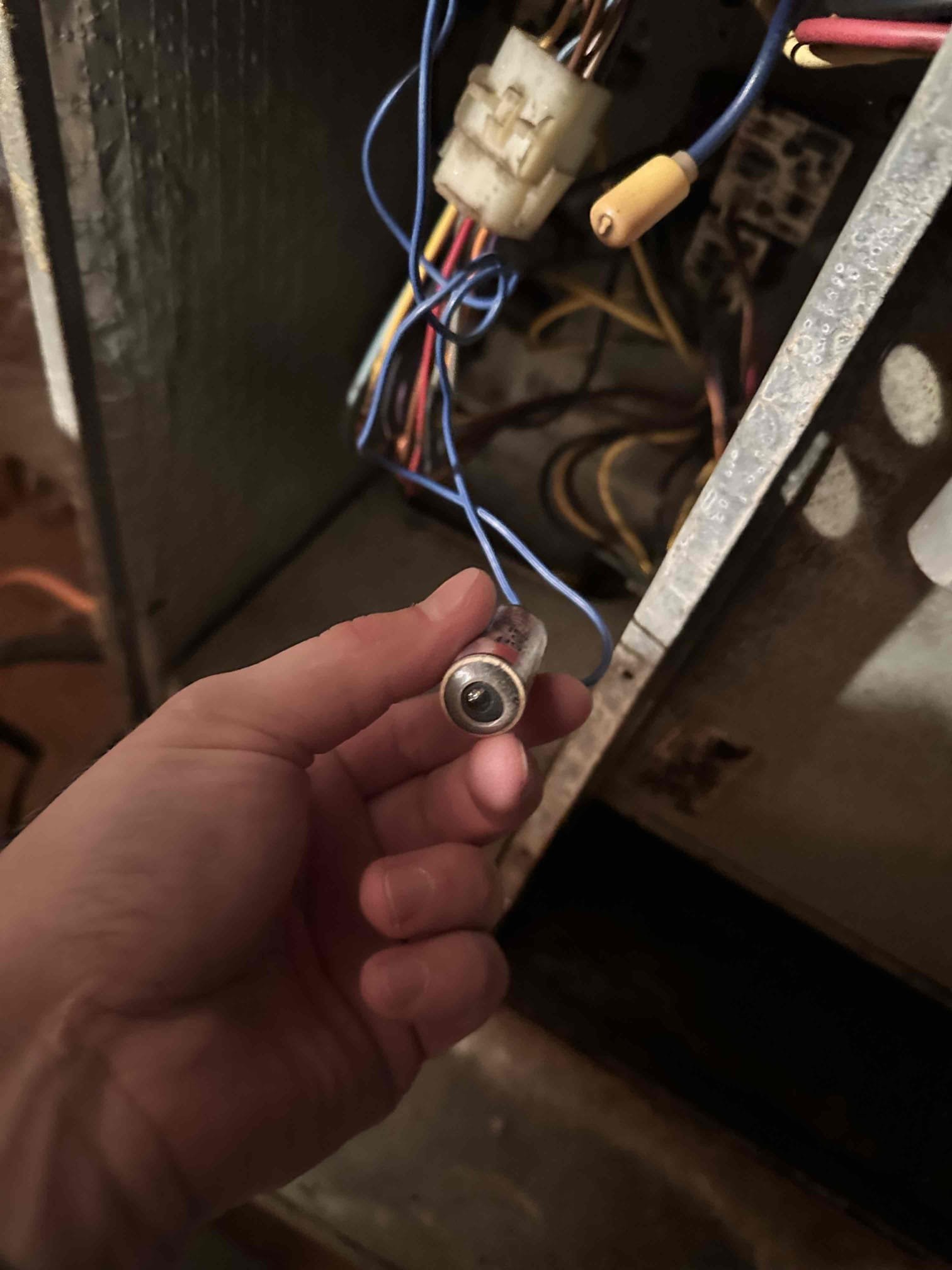 Upon arrival, I found the thermostat half way popped off the wall. I removed it and found the prongs damaged and the fuse popped in the airhandler. I installed my short finder and found no issue without the thermostat present in the wiring. Customer wanted to install their thermostat themselves. 