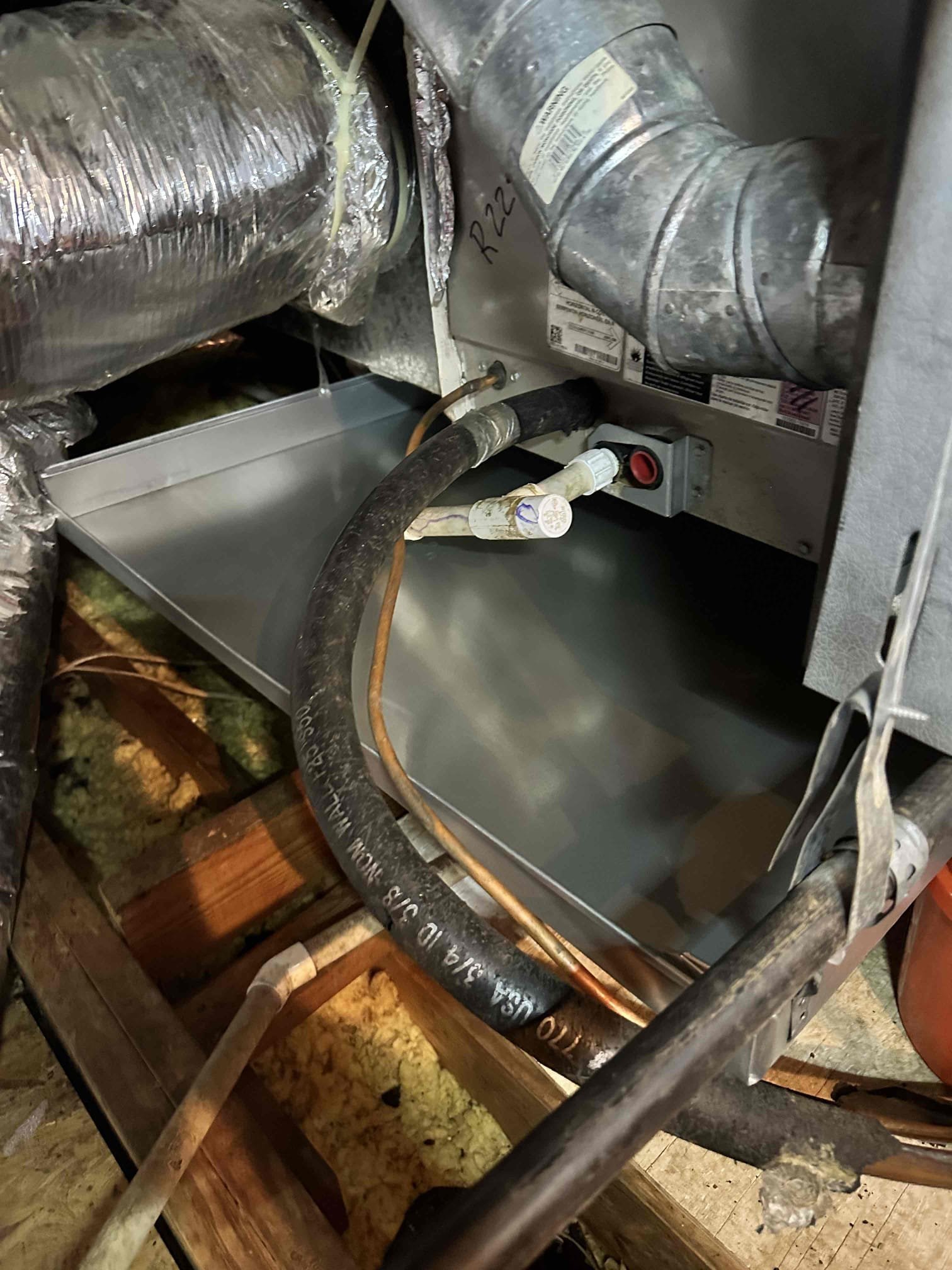 I picked up and returned to install 36x36 emergency drain pan. I ensured it had a downward pitch towards the drain, that it is level completely on drain side, and that I glued the connects for attaching the drain back. 