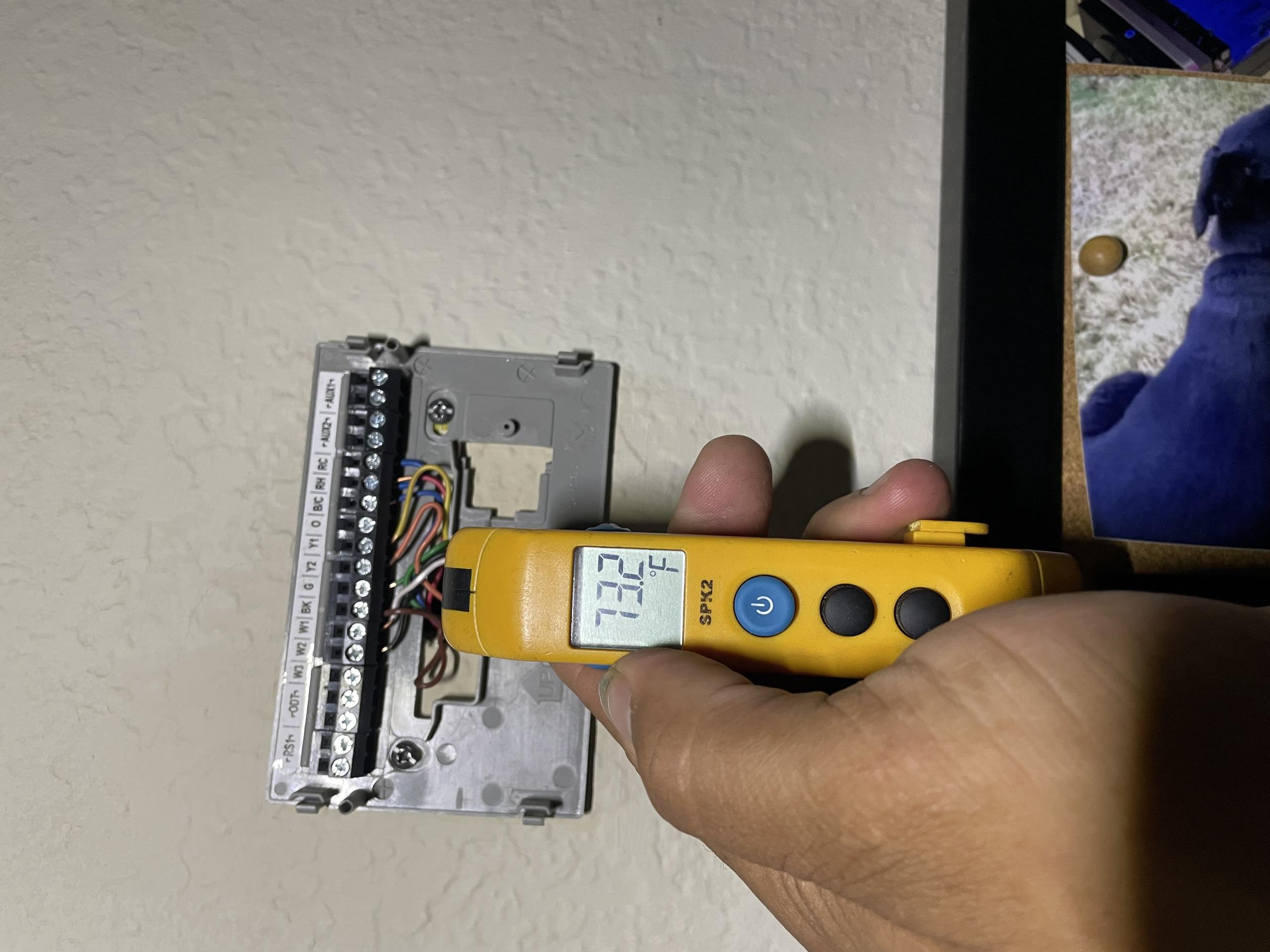 Returned to our clients home to top of system with refrigerant. I had to wait about an hour for the rain to clear. Once cleared I proceeded to charge the unit with Freon. Once charged I took temperature measurements and ensured the system was cooling wit a 20º drop. The upstairs thermostat displayed an indoor temperature of 80º which I ensured with my temperature probe and found to be incorrect. I removed the thermostat and filled in the hole with some foam insulation. I also removed the plastic flowers that were covering the thermostat. I informed our clients that we cannot have the flowers covering the thermostat and before leaving the thermostat had settled to 76º. Paul also elected to replace the filter for the upstairs unit today. The system is cooling properly on departure.