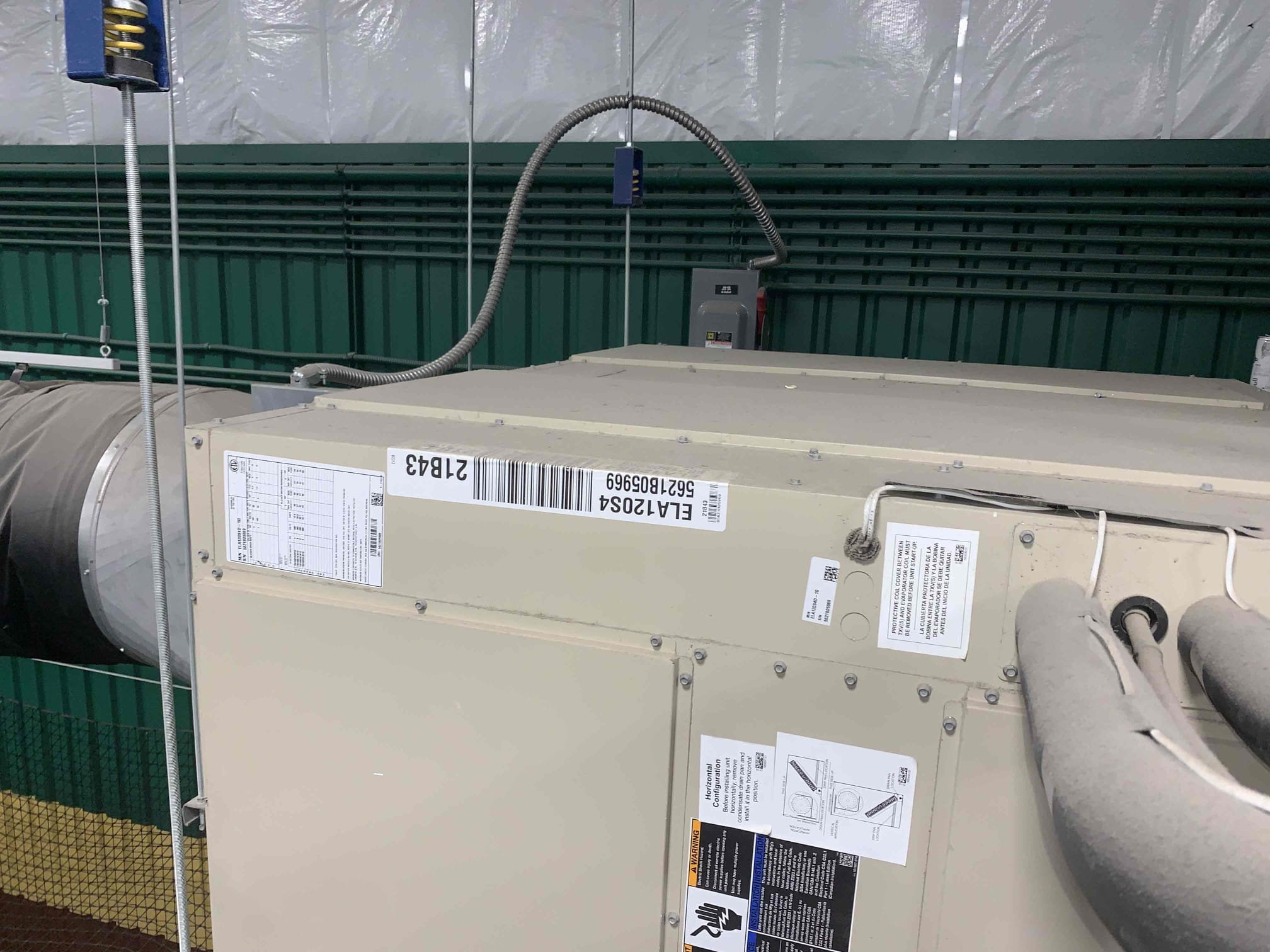 Arrived on site, found water in drain pan. Provided quote to clear drain line.  Building manager gave me verbal approval over the phone to go ahead with the work. I started by clearing the drain pan of water and sucking out the p trap. I then proceeded to blow out the drain line with nitrogen. I then tested the drain line with several gallons of water to verify that the drain line was draining correctly. Turned on system without issue and continued to run.