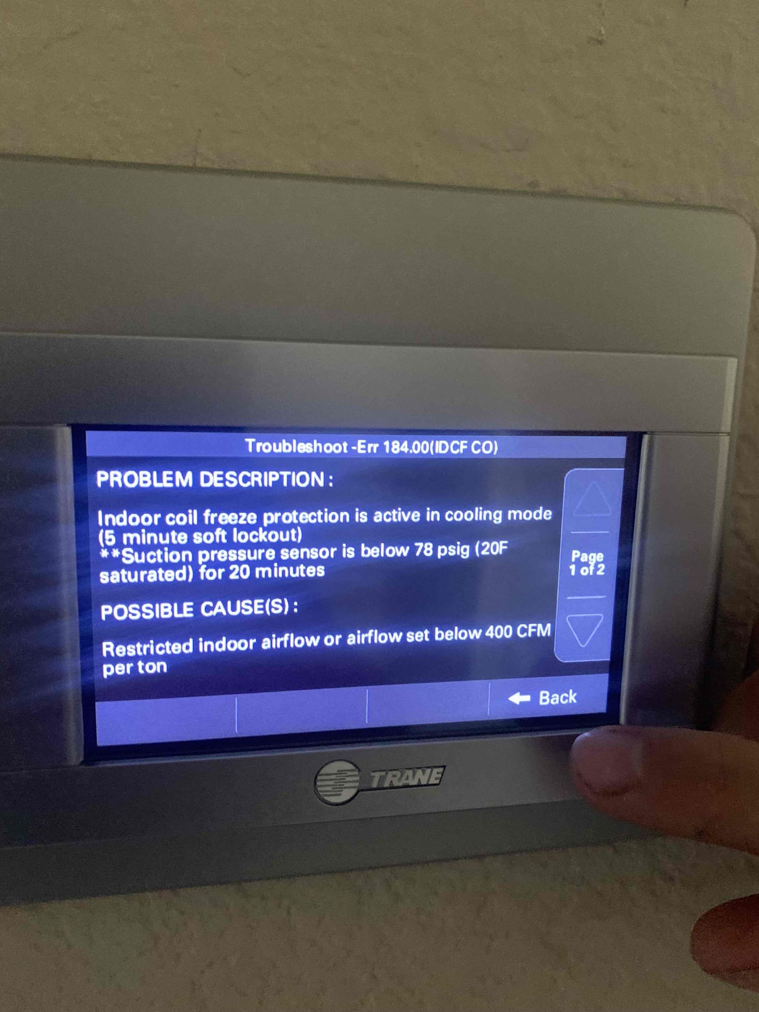 Arrived on site, found alerts on thermostat for low pressure lock out. Reset power on system and it came on. Measured refrigerant pressures and found there to be a restriction on the low side. Upon further inspection, we found that some of the TXV capillaries are touching the liquid line. Upon removing the sensing bulb and warming it up pressures returned to normal. We removed the capillaries from the liquid line and adjusted the bulb position to 2 o’clock from 3 o’clock. Pressures started to look better after this, but still indicating a restriction in the system. Informed homeowner that we will need to replace this txv under parts and labor warranty.