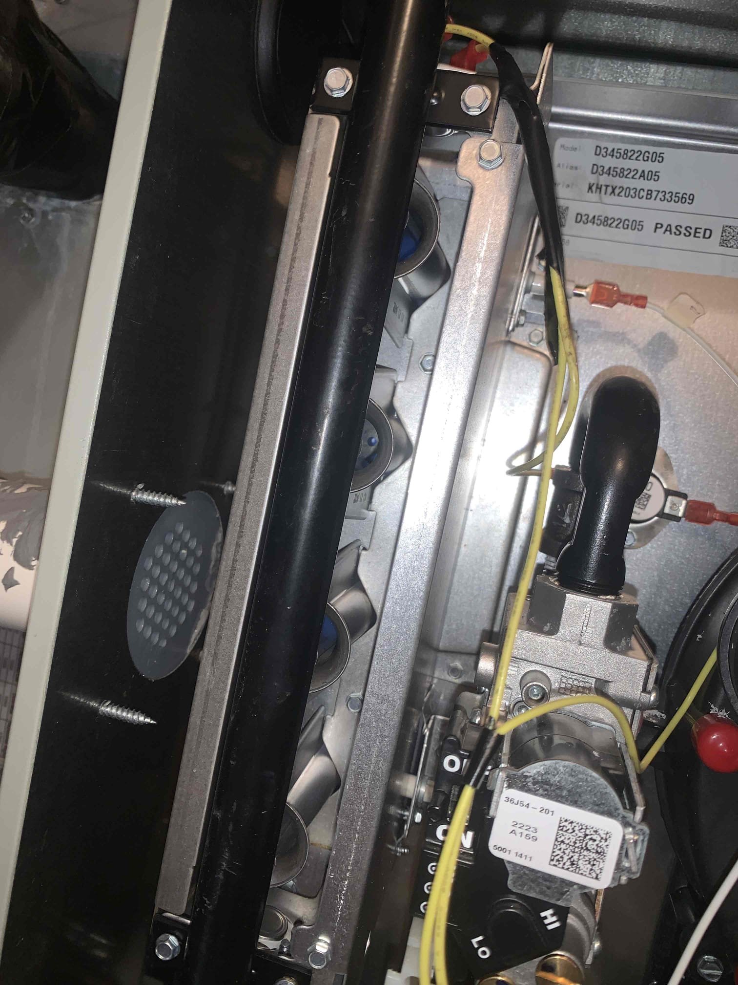 Arrived on site, homeowner stated there was a strong chemical smell (last night) before the unit stopped keeping up with the set point. I started by turning on the fan and immediately noticed that it had not come on. I then checked the refrigerant lines and found them to be frozen around the evaporator coil as well as the condenser. I smelled burning around the blower motor housing. Called American standard tech support to verify the circuit board was still working properly. Trane rep was able to verify that circuit board was still working properly and that only the motor was damaged. I replaced the motor under parts and labor warranty and tested extensively as this is the second motor to burn out. Examined every wiring connection on entire system and found corrosion on neutral wire coming into the furnace. No signs of water damage in the furnace compartment. Tested motor in various functions and performance was good. Proceeded on to dryer vent cleaning and heating maintenance.