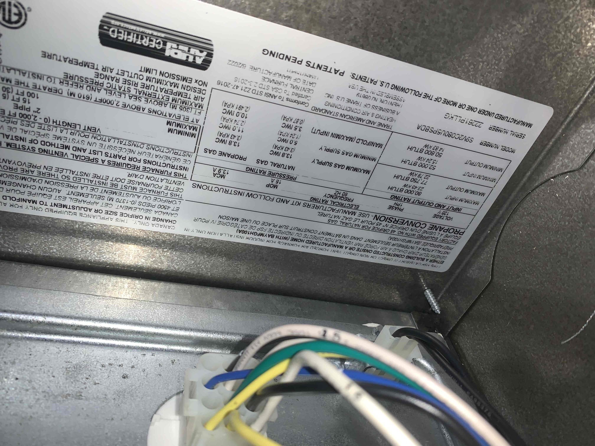 Arrived on site, homeowner stated there was a strong chemical smell (last night) before the unit stopped keeping up with the set point. I started by turning on the fan and immediately noticed that it had not come on. I then checked the refrigerant lines and found them to be frozen around the evaporator coil as well as the condenser. I smelled burning around the blower motor housing. Called American standard tech support to verify the circuit board was still working properly. Trane rep was able to verify that circuit board was still working properly and that only the motor was damaged. I replaced the motor under parts and labor warranty and tested extensively as this is the second motor to burn out. Examined every wiring connection on entire system and found corrosion on neutral wire coming into the furnace. No signs of water damage in the furnace compartment. Tested motor in various functions and performance was good. Proceeded on to dryer vent cleaning and heating maintenance.