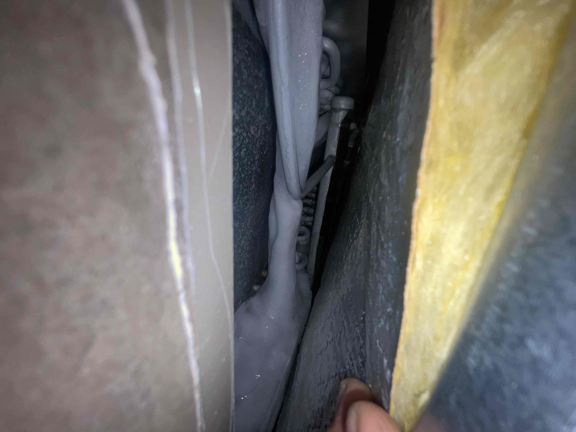 I arrived out our clients home for a single system with 2 zone unit not cooling properly.
James first showed me the locations to booth thermostats and the attic access. I then proceeded outside to the outdoor equipment. I immediately noticed the suction line to be frozen over. I shut the unit off at the outdoor disconnect and tested the capacitor and contactor. The capacitor was reading lower than previously measured during the august 4th maintenance visit.
I then went into the attic and found the evaporator coil completely frozen. I shared my finding with James and we discussed either thawing out the coil by turning on the furnace or shutting off the compressor and allowing the ice to naturally melt. We agreed that allowing the ice to melt naturally was the best option to not cause any potential damage to the evaporator coil. James elected to replace the capacitor today and we are scheduled to return tomorrow to preform a leak search on the coil. We will also provide a filter as a cou