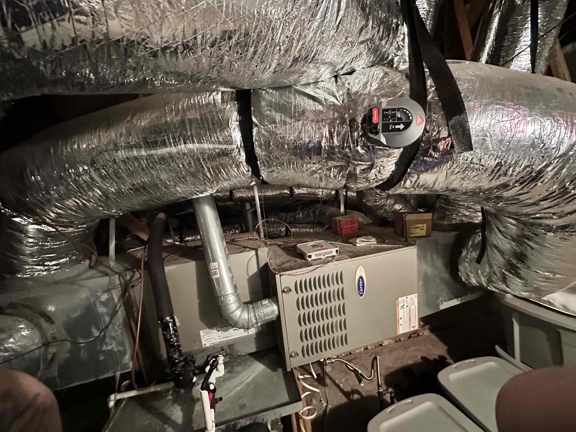 Upon arrival, I hooked up my gauges to check resting pressures. I proceed to use my leak detector to check the indoor and outdoor coils. The leak detector did not detect any refrigerant leaks. I turned the unit on and checked running pressures. I took a temperature split and examined the ducts. I located a bypass duct that was set to .7wc. I turned it down to .4wc. The system is cooling inside of manufacture specifications. Customer and I spoke about surge protection and air cleaning devices. I provided pricing to install them to the system to help with allergies and protect the electrical from power fluctuation.