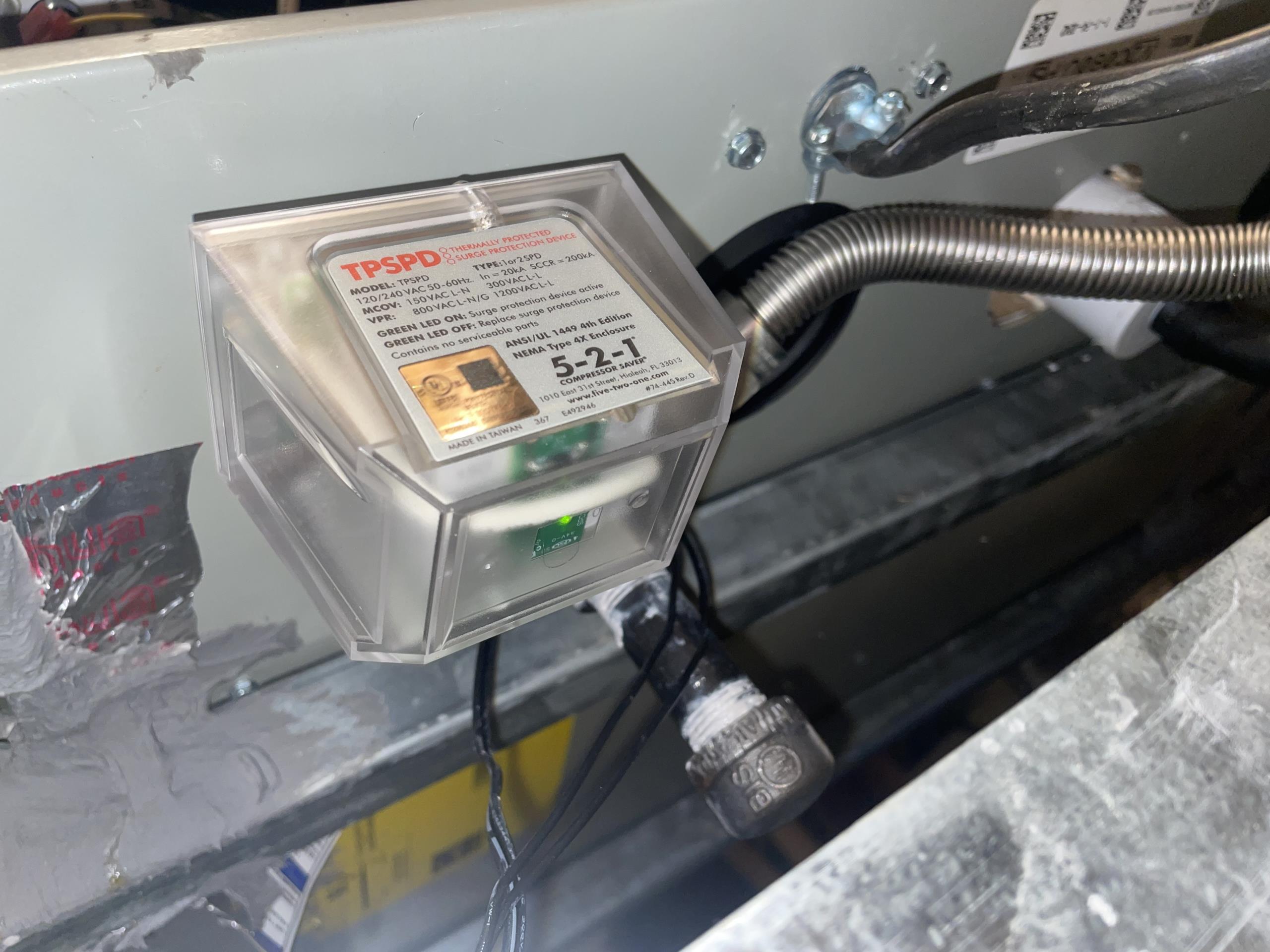 We arrived at our clients home due to concerns regarding the blower motor inside the furnace. I arrived at a client‘s home and immediately began to test and inspect the high voltage connections inside the furnace and that the emergency shut off switch in the attic. I then proceeded into the garage where the electrical panel was located. I took off the front cover for the electrical panel and found two ““ capacitors “and a full home search protector on the electrical panel. The electrical panel had dust and debris collected throughout and Jesse recommended that her electrician come out and clean and maintenance the electrical panel. She stated that the capacitors were actually lightning.absorbers and not actual capacitor on the panel. We then agreed to install a surge protector on the furnace equipment. We discussed how the part had a 3 year warranty and that ADON would give it a 1 year warranty. We suggested that if any electrical issue, pertaining to the furnace, happened within that 