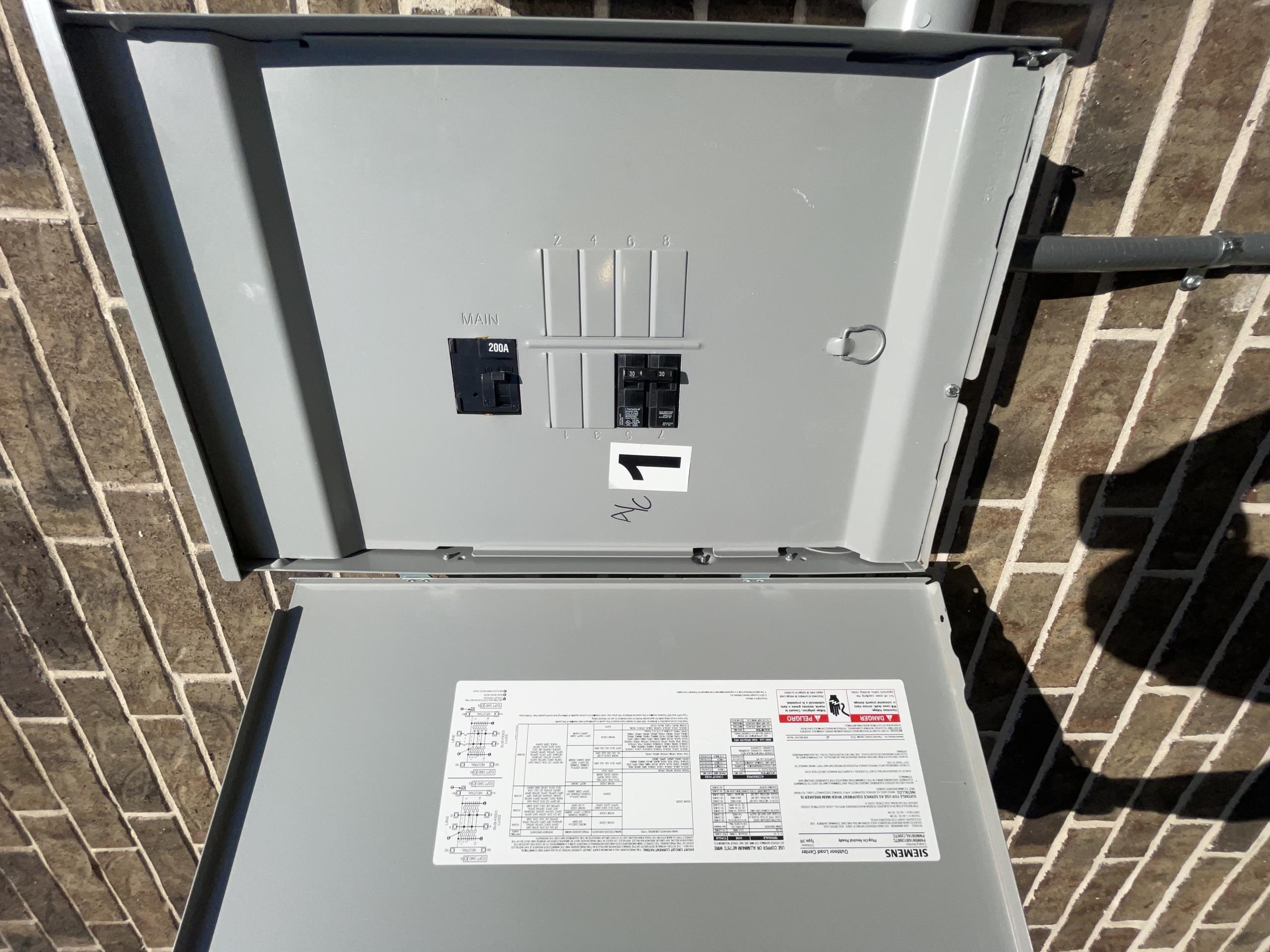 Arrived at our clients home to inspect the newly installed equipment. The builder added a 3 ton outdoor condenser and a 2.5 ton indoor evaporator coil with a 3 ton furnace. The unit is installed properly with a single 16” return duct and they added the new unit to supply air to all 4 bedrooms and the 3 full bathrooms of the home. I took a video of the duct work in the attic and showed this to Larry. What I found is that the new unit has adequate return air but it is not connected into any of the corresponding bedrooms, this single return is only returning air from the hallway and not from the master area at all. Is is also missing surrounding attic insulation around the return box.
The existing bedroom returns are still connected to the larger 5 Ton Unit. I explained to Larry that even though the return air is enough for the size of the equipment it presents a “comfort” problem with uneven distribution and overall cycle of air. I also found the new attic unit to be without a water shut