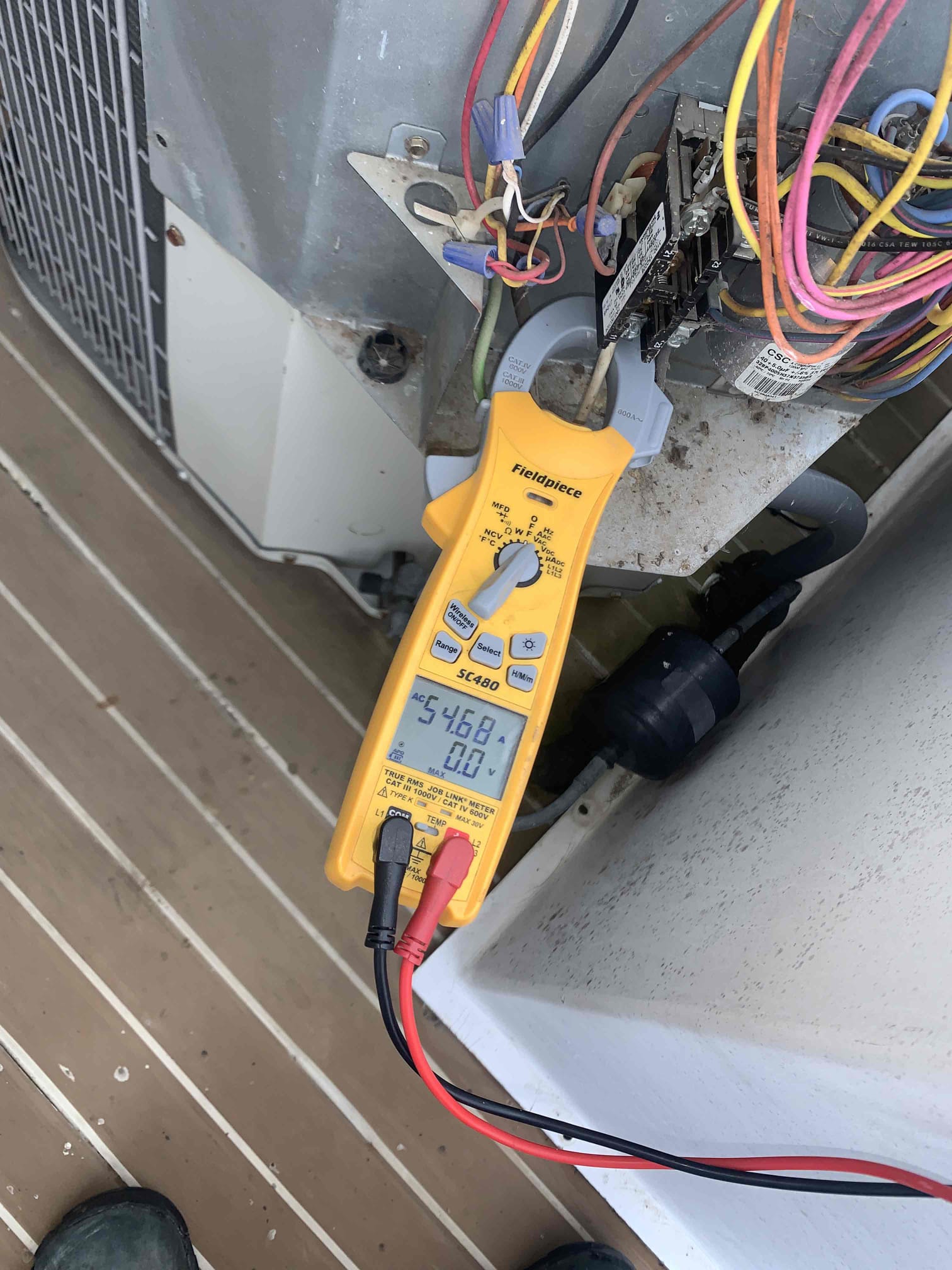 2T 2013 carrier Heatpump
1. Visually inspected condenser coil for debris/ dirty.
2. Inspected condenser fan motor.
3. Inspected condenser fan blades.
4. Inspected/ cleaned wiring connections.
5. Tested compressor/ condenser fan motor capacitor.
6. Checked compressor amp draw.
7. Checked condenser fan motor amp draw.
8. Inspected / replaced return filter.
9. Inspected return plenum for debris/ dirty.
10. Inspected evaporator coil.
11. Inspected blower motor/ blower wheel.
12. Checked blower amp draw.
13. Measured temperature differential from supply to return. 20 degrees measured.
14. Inspected drain lines 
15. Rinsed condenser unit to promote heat exchange
16. Inspected and measured amps on heat kit

Found low amp draw on heat kit this leads me to believe this heat kit is very worn out likely due to humidity from the lake. Provided estimates for heat kit replacement. Outdoor fan motor is in rough shape. Bearings are not freely spinning, however amp draw is within range. Also noticed un