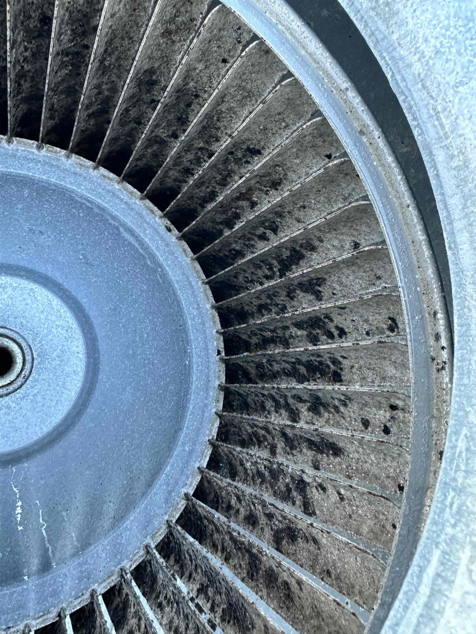 I installed a factory condenser fan motor and performed a blower wheel cleaning. I cleaned the blower wheel to the best of my ability. These is heavy surface rust present. I tested the system when the work was finished to ensure it was performing properly. System is cooling upon departure.