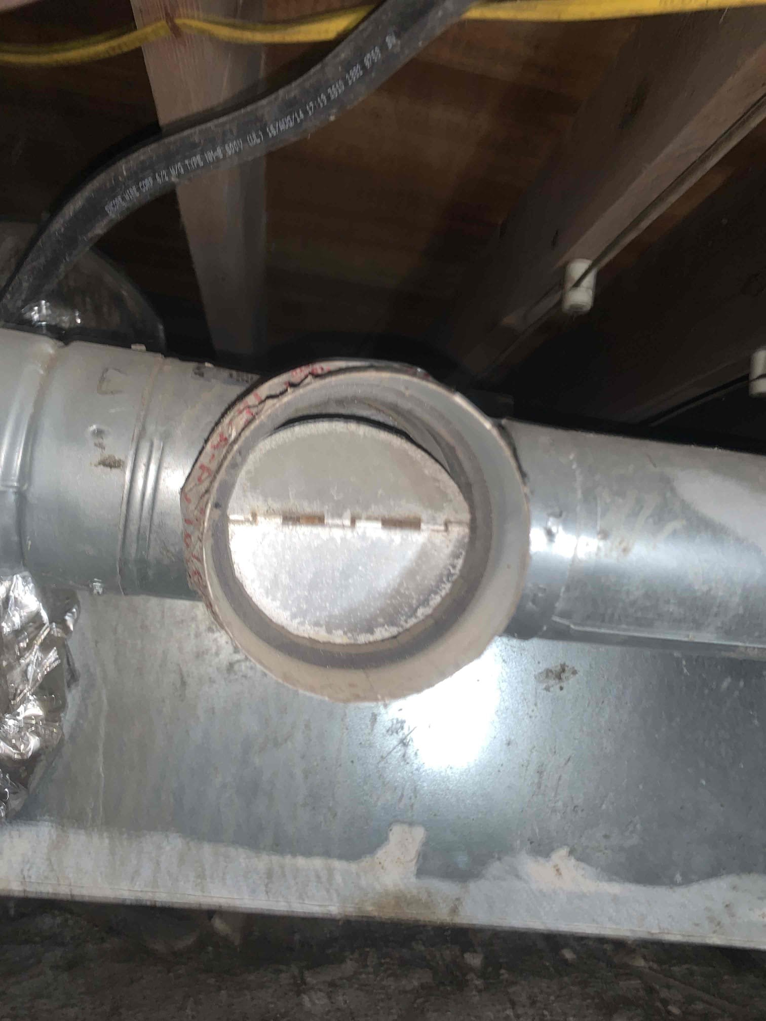 Arrived on site for duct replacement estimate. Began inspection at the crawl space. I initially noticed a large amount of water on the rear right side of house near some water pipe, however I did notice see any active dripping. When I brought his up to the homeowner he stated he knew about the issue and it was not a water leak. I took photos of many sagging and restricted ducts and 3 completely severed ducts. It was found that there are no saddles hanging the duct and there are many kinks and messy duct runs. I also noticed that the flue pipe has a run outside from the unit, however there is a t that is not properly sealed and is letting exhaust gasses out under the house. Discussed with homeowners the immediate safety concern with the flue pipe, the severed ducts, and improperly hung ducts. Homeowner informed us that it did not seem like they were receiving air in their front rooms. Proceeding to the attic I found 2 completely crushed ducts and 1 kink only allowing at best 50 percent 