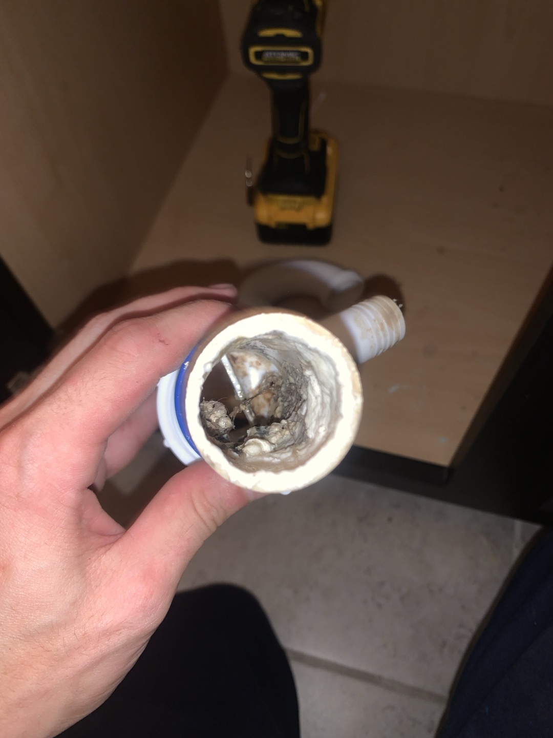 Arrived on site for no cool, due to clogged drain line. Homeowner noticed water coming out of the secondary drain line. Homeowner stated everything else was working well to his knowledge. Began inspection at vent stack and noticed there was no water. This is likely because the homeowner had the unit off for sometime and it could drain slowly. I then tested the drain line by pouring half a gallon down the drain line and sure enough it backed up to the vent stack. Perform cursory inspection of outdoor unit and found nothing of immediate concern, however, we will need to further inspect when we come back out for the maintenance. Discussed possible options for drain line unclogging including blowout valve and float switch. Homeowner elected for a level one drain clearing and maintenance performed drain line clearing, including blowing out the drain line with nitrogen and disassembling the upstairs sink where the drain line ties in and cleaning out any blockages I could find there. Showed v