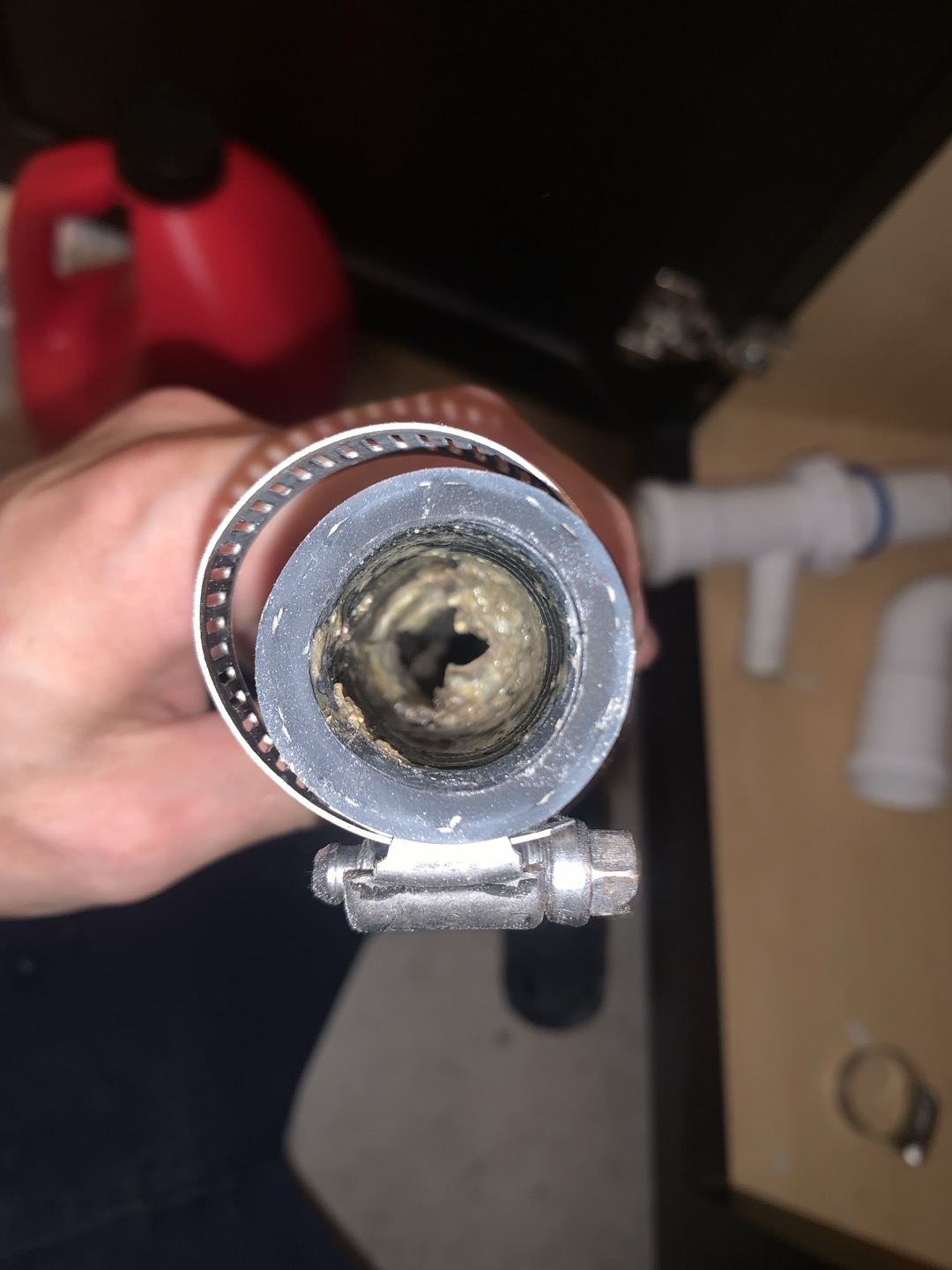 Arrived on site for no cool, due to clogged drain line. Homeowner noticed water coming out of the secondary drain line. Homeowner stated everything else was working well to his knowledge. Began inspection at vent stack and noticed there was no water. This is likely because the homeowner had the unit off for sometime and it could drain slowly. I then tested the drain line by pouring half a gallon down the drain line and sure enough it backed up to the vent stack. Perform cursory inspection of outdoor unit and found nothing of immediate concern, however, we will need to further inspect when we come back out for the maintenance. Discussed possible options for drain line unclogging including blowout valve and float switch. Homeowner elected for a level one drain clearing and maintenance performed drain line clearing, including blowing out the drain line with nitrogen and disassembling the upstairs sink where the drain line ties in and cleaning out any blockages I could find there. Showed v