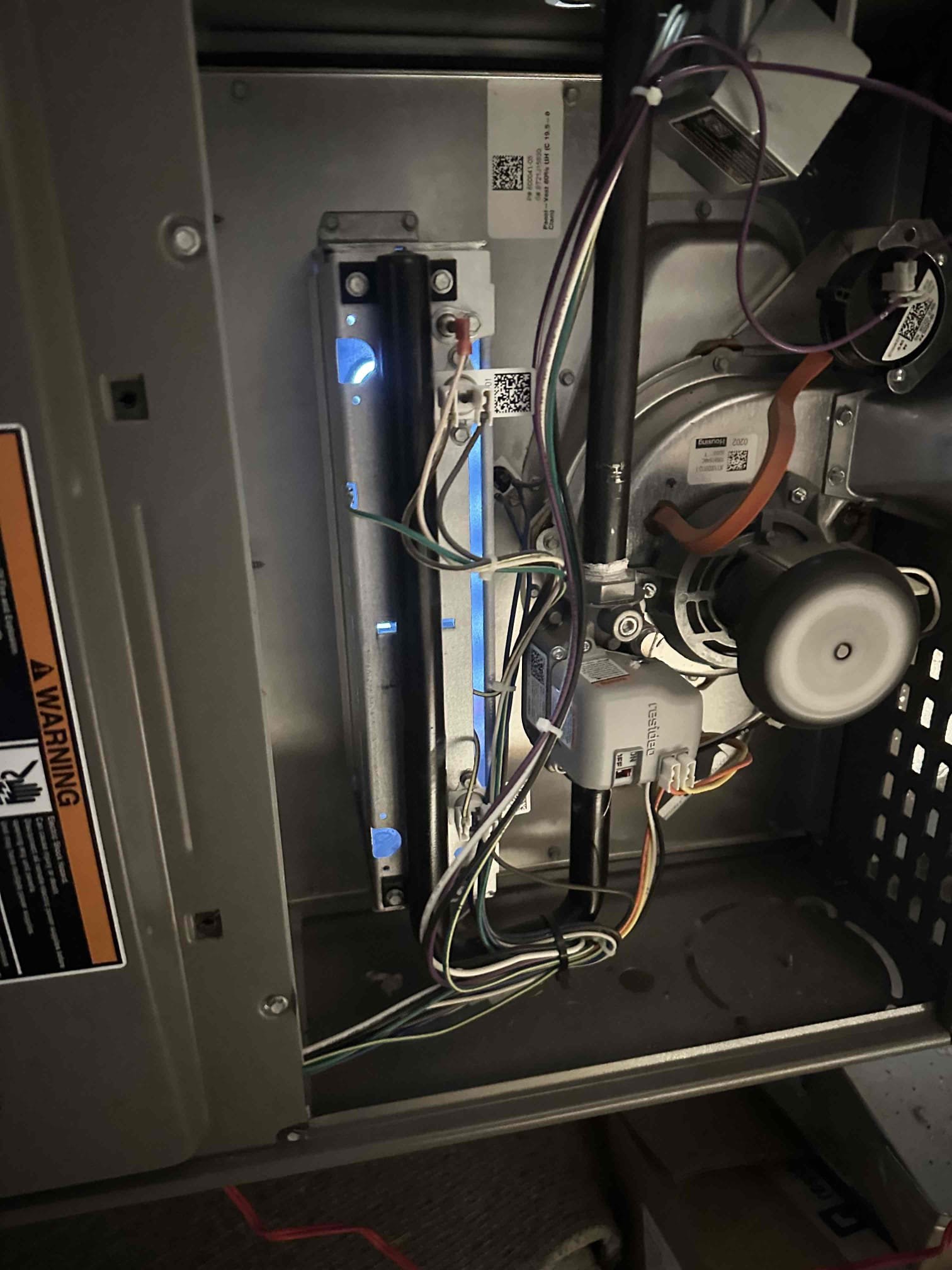 Upon arrival, I found that the discharge temperature sensor is faulty and not allowing the system to heat. I removed the sensor from the wiring and the unit came on. This sensor is a safety function for zoning systems to monitor the temperature being supplied from the system. Without this sensor, damage can occur to the system if other issues arise. I installed a replacement sensor and tested the system and found it to be heating great. Customer spoke about hail damage to the condenser fan blade. Customer wanted to wait before joining maintenance program.

I noticed a duct that was getting melted by the flue pipe. I adjusted the duct away from the flue pipe. 