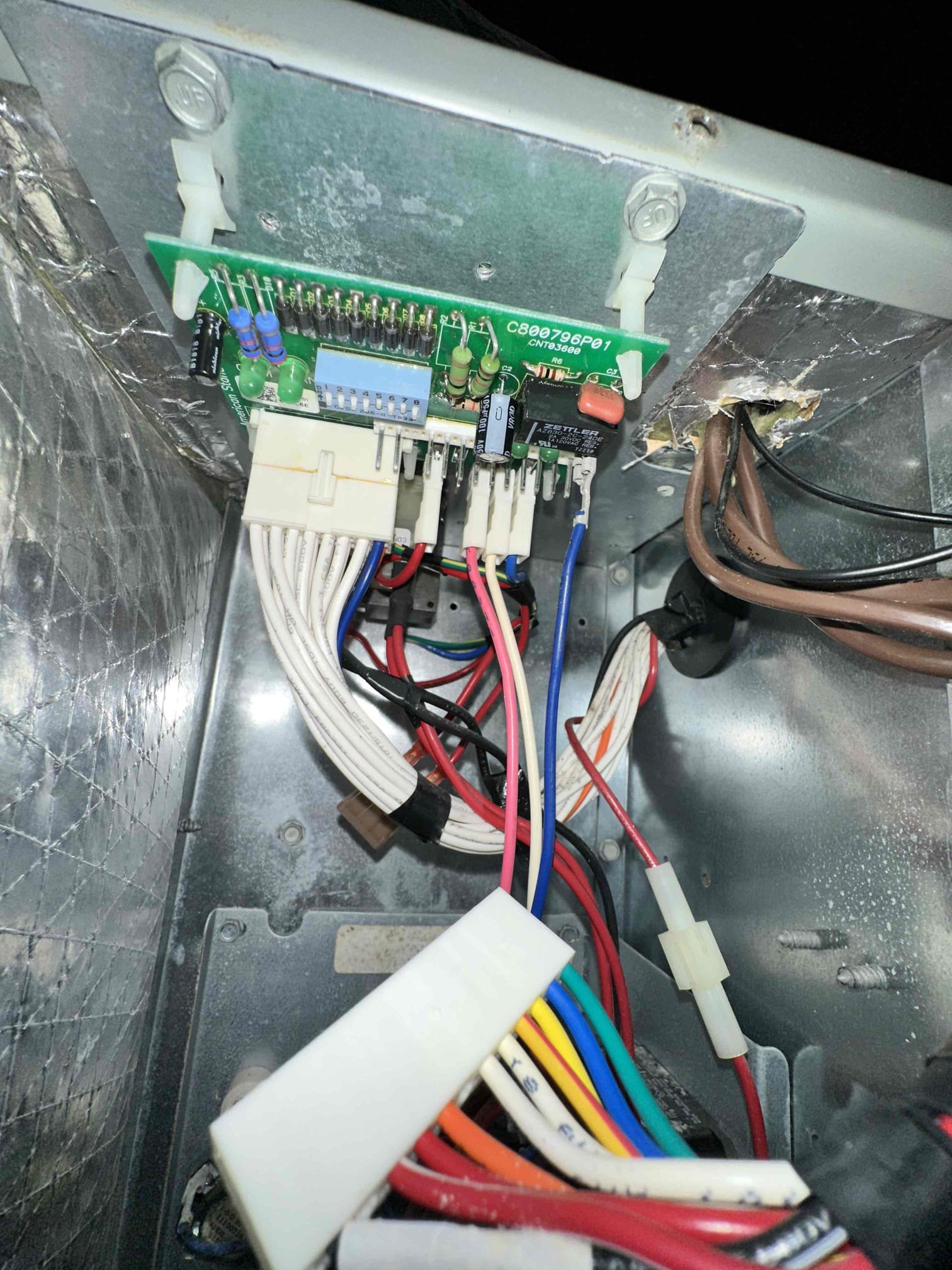 I returned and replaced the defrost temperature sensor for the smaller unit. I began to unhook wires to replace the heat kit for the main unit and discovered that I did not have the correct heat kit. The heat kit I was given by the supply house has a 9 pin plug. The one that is currently in there is for a TEM6 and has a couple wire nuts that go to the control board. From the control board it is fed to relays to activate the heat strips on a 20kw heat kit. The heat kit information isn’t obtainable due to tag damage. We will need to cross reference the model and serial from the airhandler tag from the job on 12/12/2025.