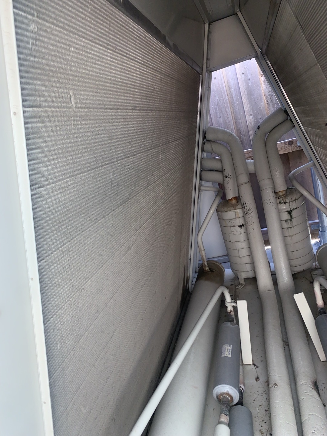 1. Visually inspected condenser coil for debris/ dirty.
2. Inspected condenser fan motor.
3. Inspected condenser fan blades.
4. Inspected/ cleaned wiring connections.
5. Tested compressor/ condenser fan motor capacitor.
6. Inspected / replaced return filter.
7. Inspected return plenum for debris/ dirty.
8. Inspected evaporator coil.
9. Inspected blower motor/ blower wheel.
10. Checked blower amp draw.
11. Measured temperature differential from supply to return. 20 degrees measured.
12. Tested capacitor and contactor (outdoor electrical)
13. Rinsed condenser unit to promote heat exchange
14. Tested electric heat and found no issue

AHU/CU-1 condenser fan motor making noise when running however blade spins freely and amps are not too high
DOAS- system still down from bad compressor estimate left by another company to repair. Unit missing fuses not possible to fully test at this time.