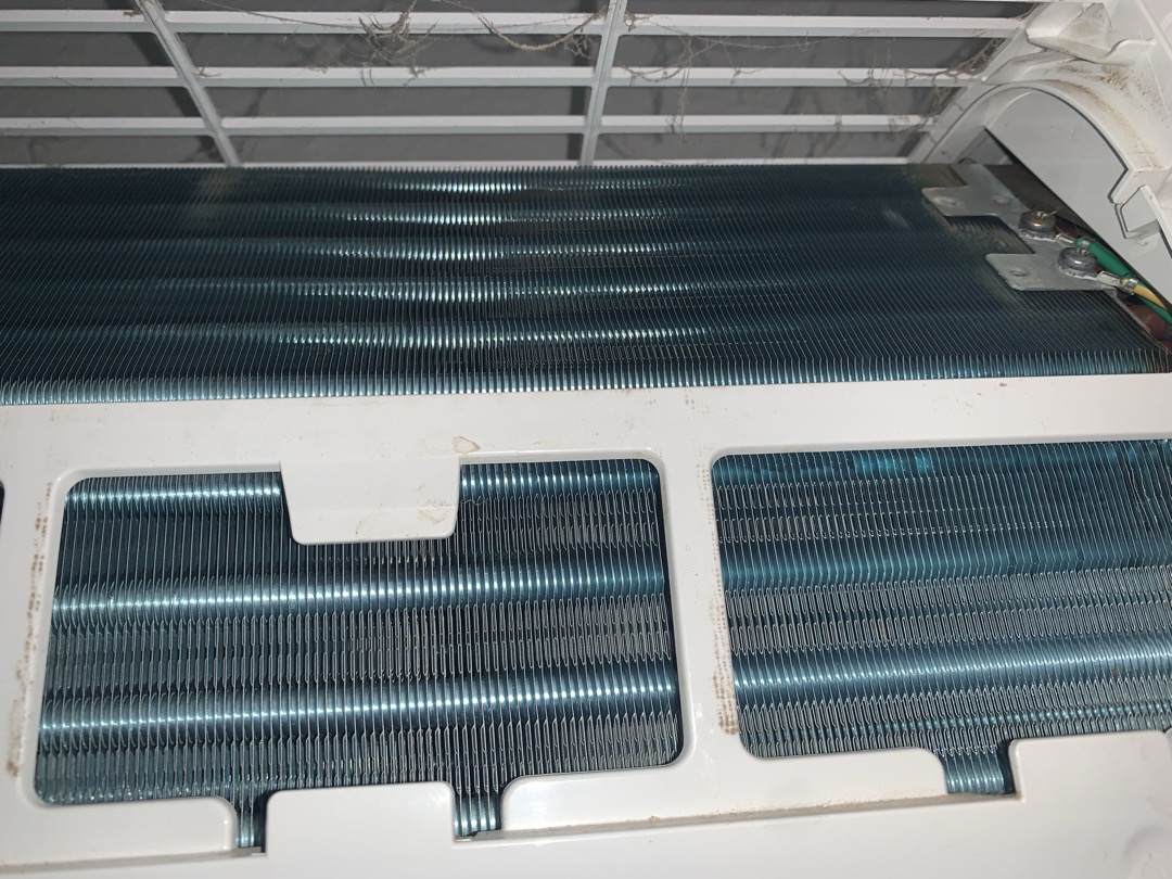 Arrived on site for heating maintenance on Gree three head mini split from 2019. Homeowner stated system was not keeping up in living room area. The other two heads were in bedrooms. I washed the filters for all three heads as well as the condensing unit outside. Upon taking a temp split, I was only getting a 10° split in heating and cooling lead me to believe there’s a problem with the refrigerant levels. I did not have the mini split adapter on hand and was unable to take refrigerant pressures at this time. I then conducted a leak test on the copper lines, condensing unit, and all three heads. It was at this point I detected a leak at the living room evaporator video included. I then check the warranty status and found that it was no longer under warranty. I then discussed with the homeowner possible options for addressing the issue. I informed the homeowner that our options are very limited since it is not under warranty and 410 a equipment has been phased out and I can no longer pu