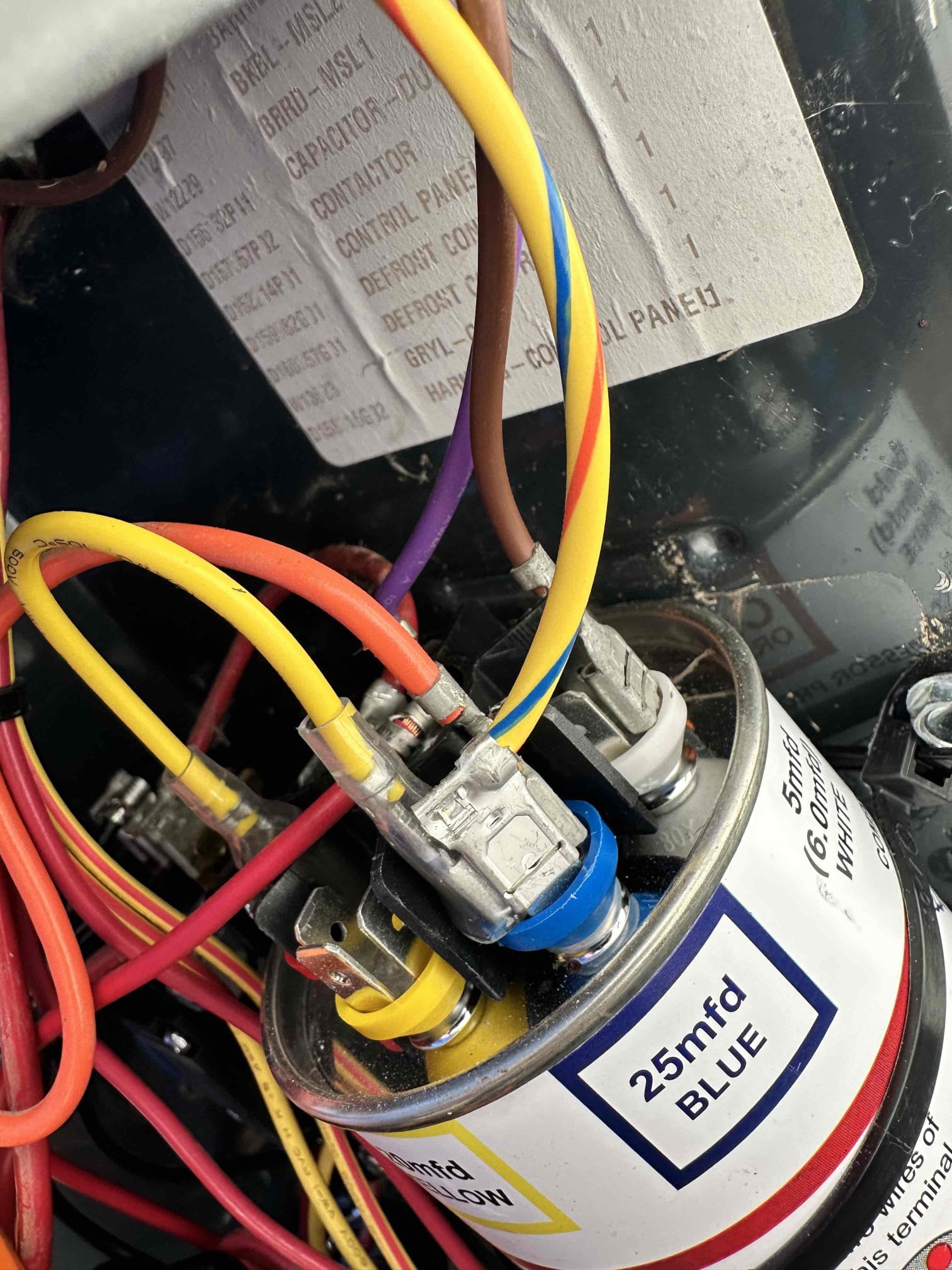 Upon arrival, I found the system was off. I pulled the disconnect for the office unit and turned it on. I opened the outdoor panel and found a spade connector for the fan motor not connected to the capacitor. I connected it and tested the unit. The system is fully operational, but I did notice an issue on the rise. I observed the sub cooling was high and moving erratically after 15 minutes of run time. I proceeded to the attic and took a temperature split. The temperature split was only an 11. I verified warranty on the airhandler and priced a warranty TXV. I provided 2 options.
1. Replace TXV, refrigerant filter, snd reuse current refrigerant 
2. Replaced TXV, refrigerant filter, and all of the refrigerant.

Replacing all of the refrigerant removes the risk of the refrigerant being contaminated and causing another issue.