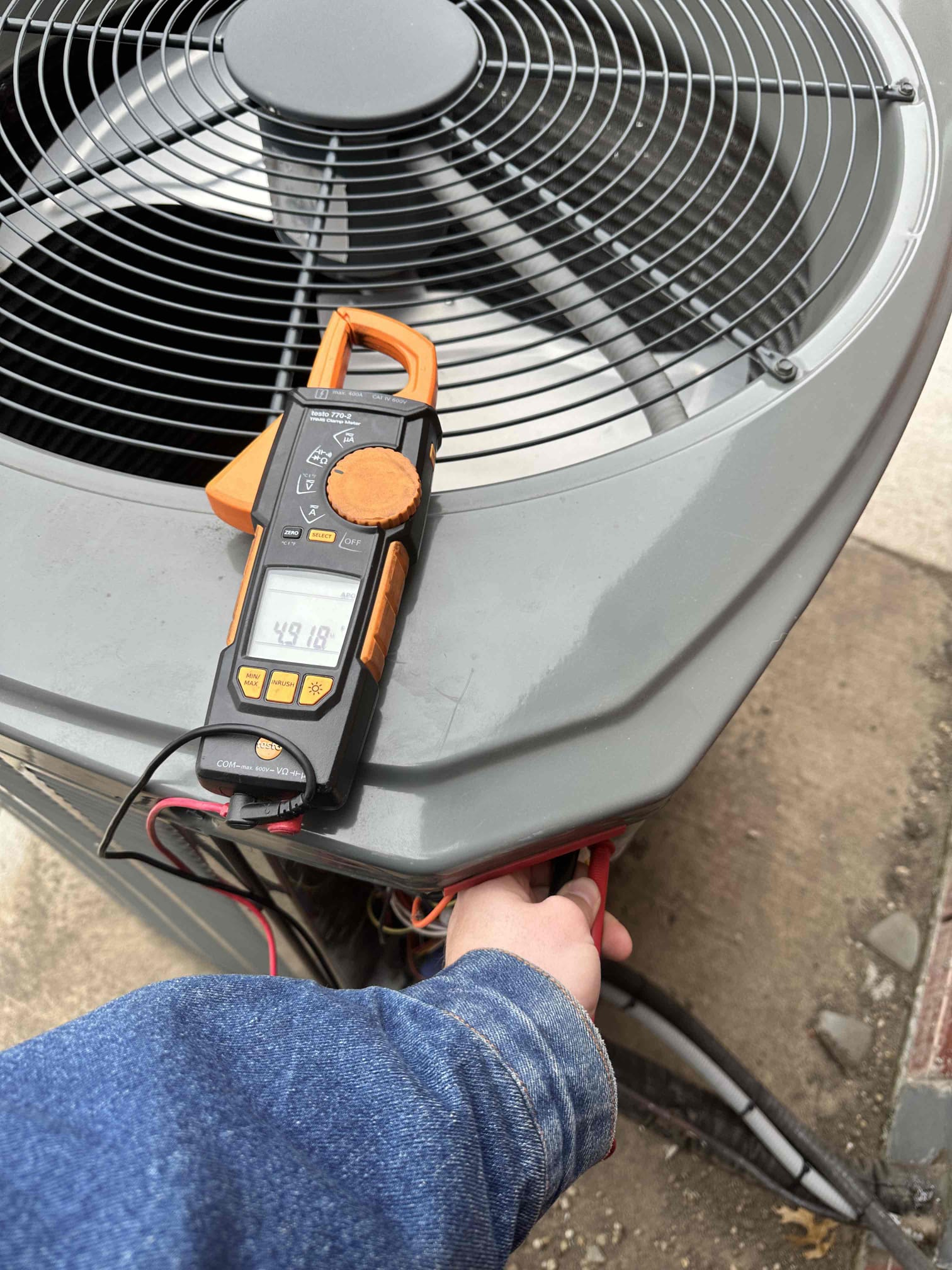 I performed a single heating maintenance on a 2022 heat pump system. I checked amps, capacitor, filter, electrical, cleanliness, heat kit, and safeties. I noticed that the evaporator coil is emitting an odor and becoming oxidized. The oxidation affects the efficiency of the system by limiting temperature transfer. The odor appears to be the earlier stages of dirty sox syndrome. Dirty Sox syndrome is where the evaporator coil forms odor emitting growth in between the fins of the evaporator coil. I recommend adding surge protection to the equipment. Surges can short out compressors, motors, thermostats, and control boards. 

When I arrived, I noticed error codes on the thermostat. I investigated and determined it was due to the wireless sensor needing batteries. I informed the customer, and they will replace the batteries. 